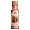 Eine 100-ml-Flasche Calvi Natives Olivenöl extra Reuza Bio mit einem Etikett im Vintage-Stil und Kupferfolie.