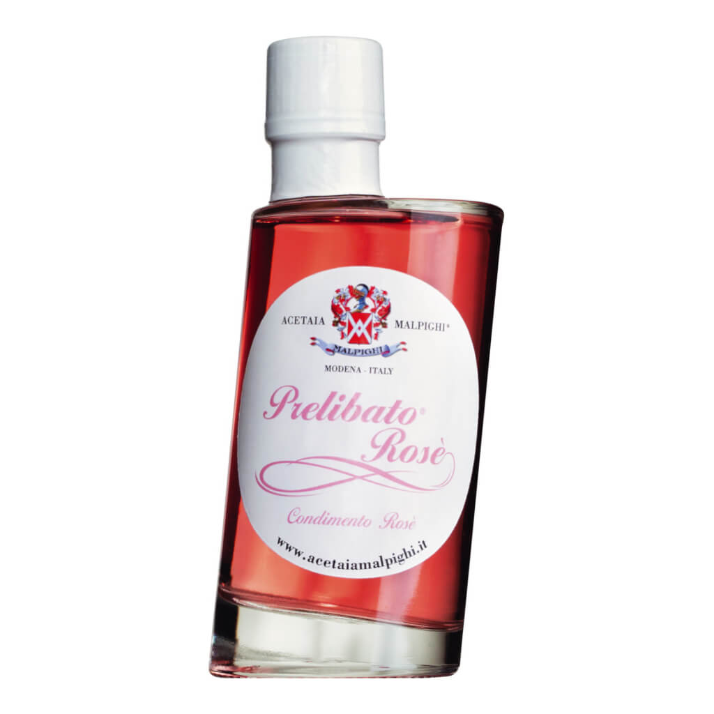 Eine 200-ml-Flasche Prelibato Rosé Dressing von Acetaia Malpighi mit rosa Flüssigkeit und weißem Verschluss mit italienischem Etikett.