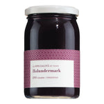 Ein 290-g-Glas mit weißem Deckel und violettem Etikett: Le Specialità di Viani Holundermark ungesüßt 100% Frucht Holunderpüree.