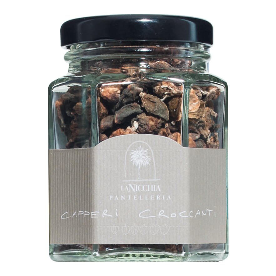Ein 30g Glas mit Capperi croccanti Kapern getrocknet von der Insel Pantelleria von La Nicchia, mit schwarzem Deckel und dem La Nicchia Etikett.