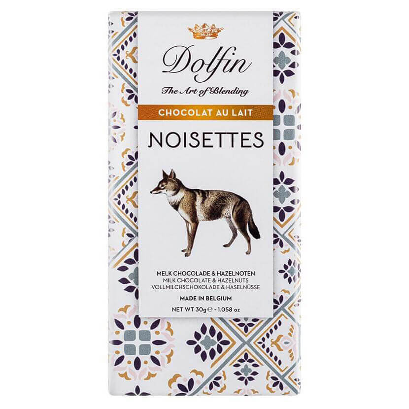 Eine 30g Dolfin Schokolade Noisettes Vollmilchschokolade mit Haselnüssen, mit Fuchskunst und gemusterter Verpackung.