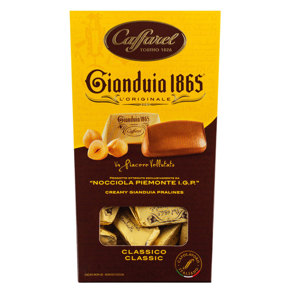 Die 150g-Packung Haselnuss-Nougat-Pralinen von Caffarel S.p.A. besteht aus cremigen Haselnuss-Nougat-Pralinen, die mit Gold umhüllt sind.
