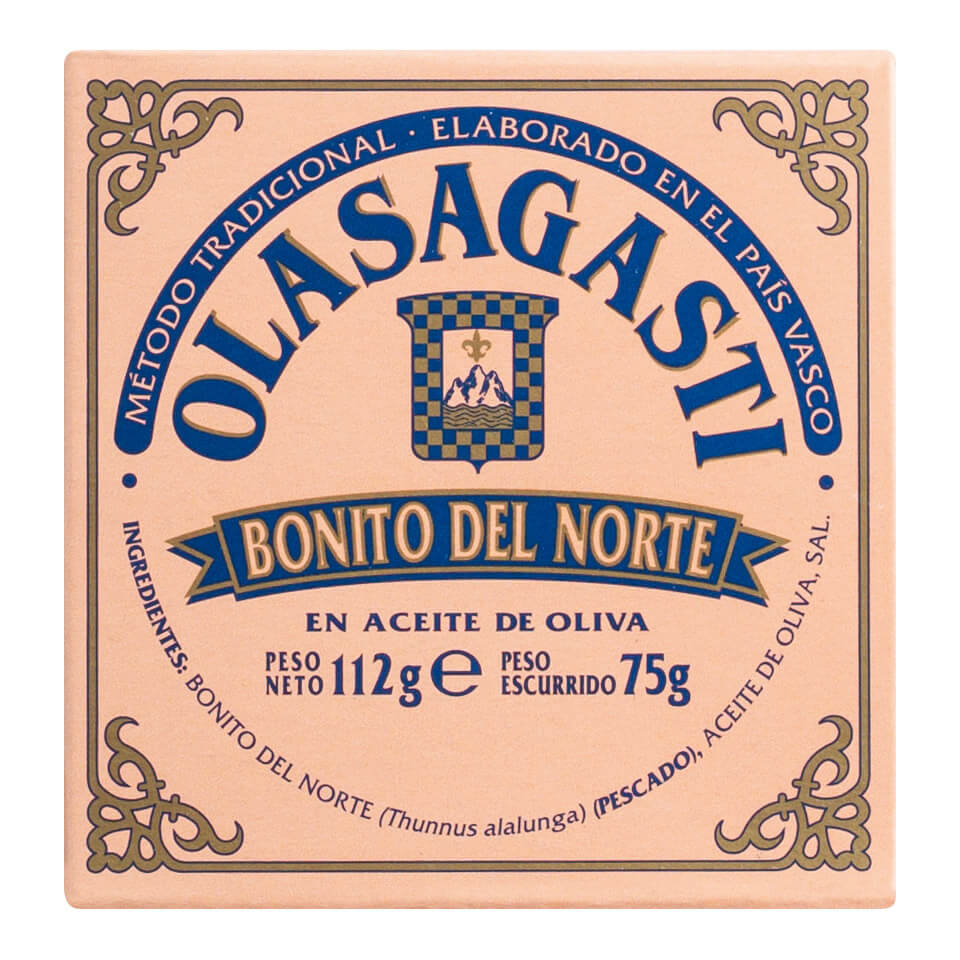 Quadratische Dose Olasagasti Tonno Alalunga - magerer, zartrosa Thunfisch bester Qualität, 120 g - mit blauer und goldener Aufschrift auf pfirsichfarbenem Hintergrund.