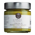 Ein 200-g-Glas der Accademia Agricole Scyavuru s.r.l. Pistaziencreme mit Salz von Scyavuru, mit silbernem Deckel und weißem Etikett.