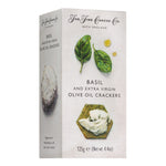 Eine Schachtel mit The Fine Cheese Co. Cracker mit Basilikum & Extra Virgin Olivenöl, 125 g.