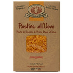 Schachtel Rustichella d'Abruzzo S.p.A. Capelli D'Angelo all uovo Eiernudeln, 250 g, mit durch ein Fenster sichtbarer Pasta.