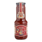 Eine 275g Glasflasche Mic's Chilli BBQ Sauce mild (7500 Scoville) von Mics Chilli mit rotem Roboter-Etikett und grauem Verschluss.
