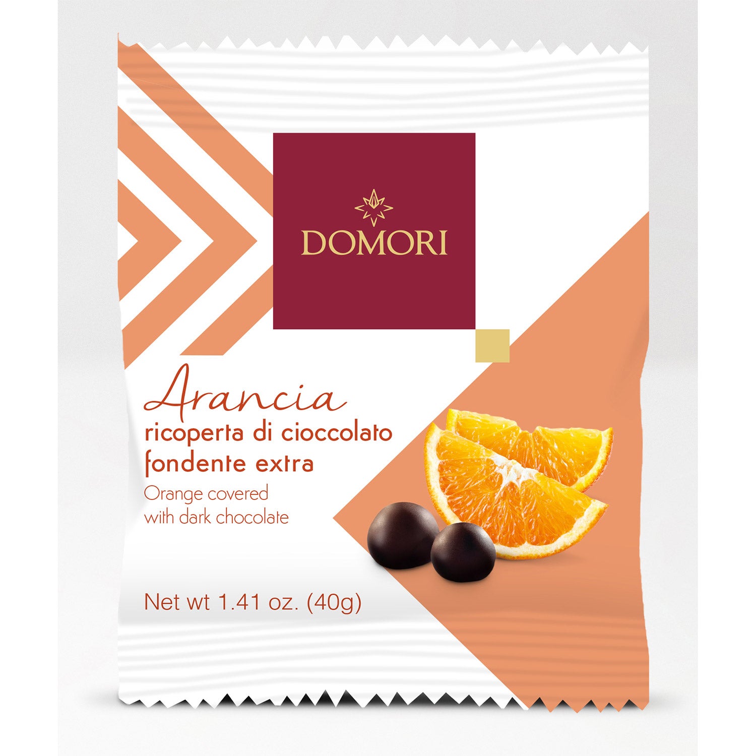 Domori Arancia, Orangenstückchen mit Schokolade, 40g: Die Verpackung zeigt Orangenscheiben und Schokokugeln auf weiß-orangefarbenem Hintergrund.