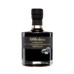 Eine 250-ml-Flasche Remodena Blaubeerbalsamico aus Modena IGP mit schwarzem Etikett und Blaubeerillustration.