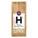Braune Papierverpackung von Antersdorfer Mühle Bio Hafer Flocken Fein Vollkornhafer, 500 g, mit sichtbarem Haferboden.
