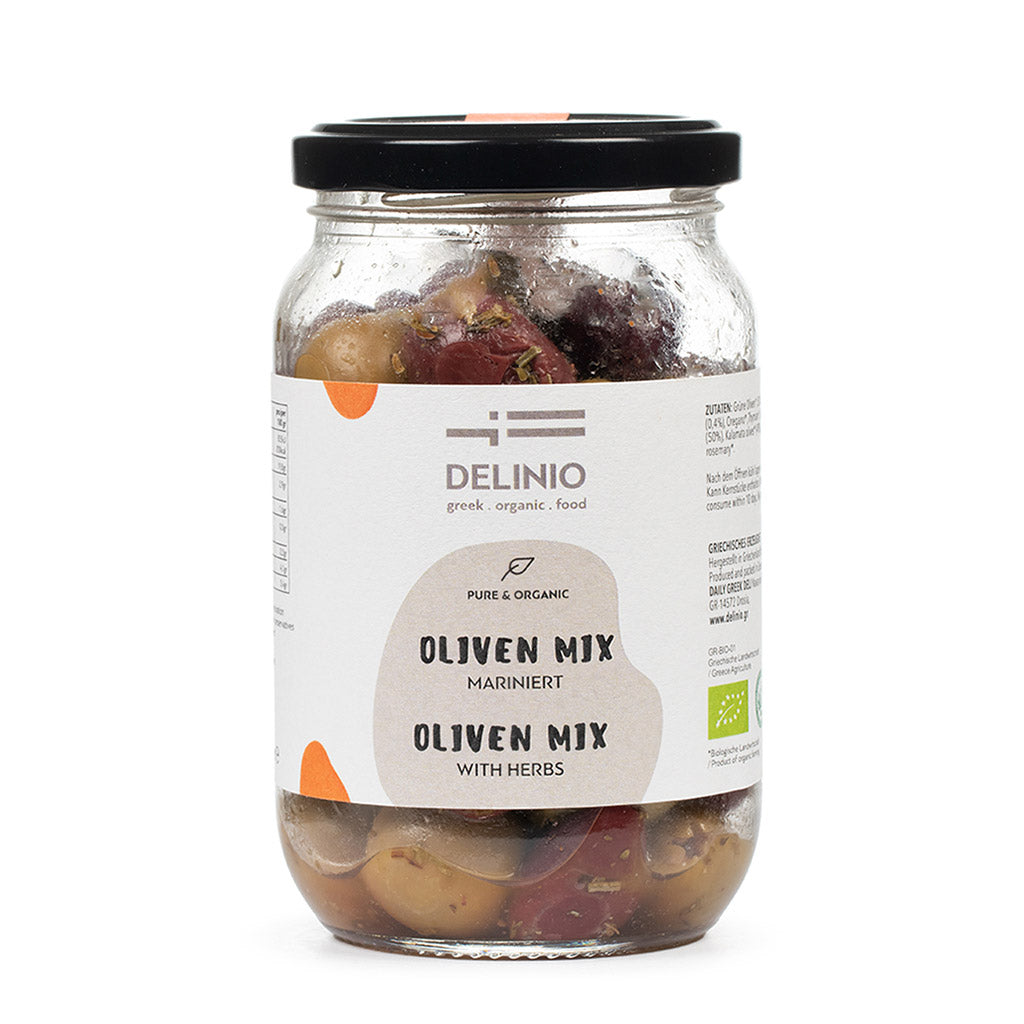 Ein 180g-Glas mit DELINIO Bio Oliven Mix - marinierte grüne und schwarze Oliven - mit schwarzem Deckel und weißem Etikett.
