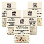 Das 5er Risotto Probierpaket von Casale Paradiso (5 x 300 g) bietet fünf verschiedene Risottomischungen von Casale Paradiso, beschriftet in italienischer und deutscher Sprache.